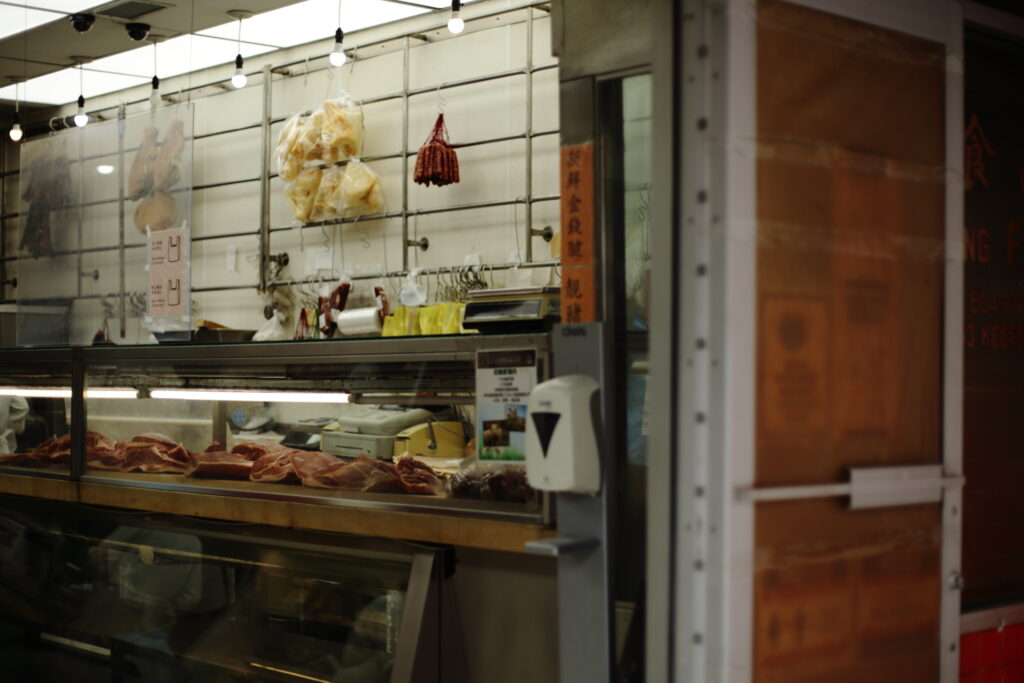 Raw meat sits on display in a Chinese meat shop.